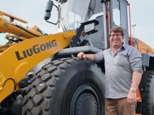 Pictured with one of LiuGong’s powerfulwheel loaders, Damien McCormick is excited to be heading up CDA’s team for LiuGong in Brisbane. Image: LiuGong Australia