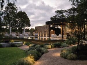 Key elements of the Peninsula Project included a pool, alfresco area, sun decks, fire pit, outdoor bath and shower, and amenities for year-round use. Image: Erik holtz/Landscaping Victoria