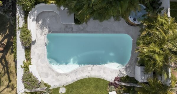 An aerial view of The Collaroy plateau Dream shows how each zone connects to the next, and how the palms create a private oasis. Images: The Landscape Association